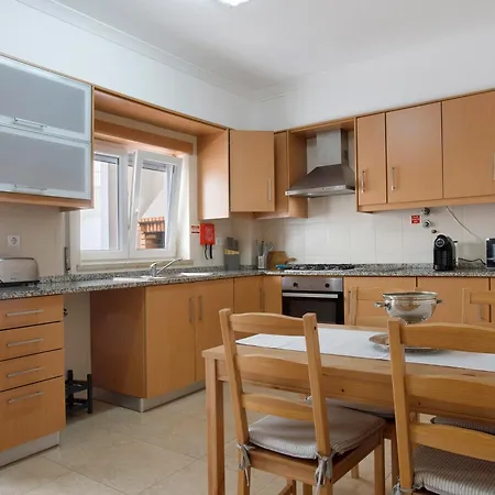 A O - Tina House Casa de Férias *